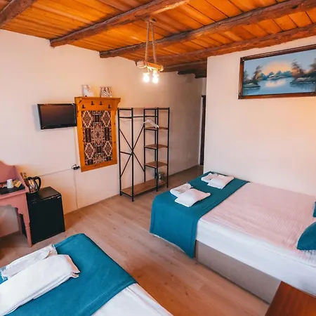 Turbel Cave House Отель *