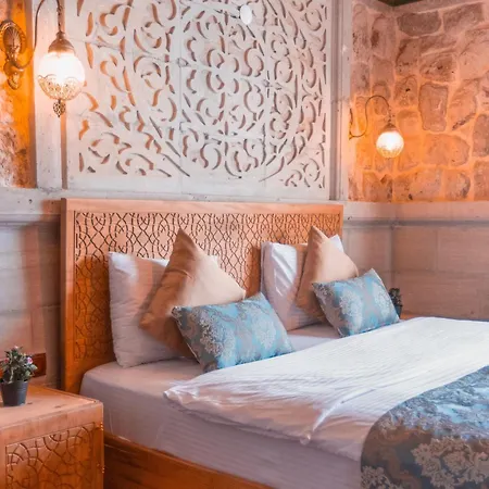 Turbel Cave House Отель *